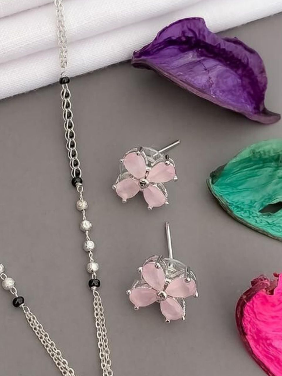 SILVER PLATED FLOWER DESIGNER MANGALSUTRA PENDED SET WITH EMERALD STONES