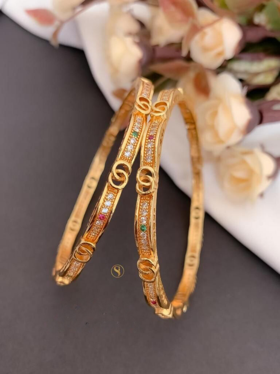 Two piece gold plated bangles